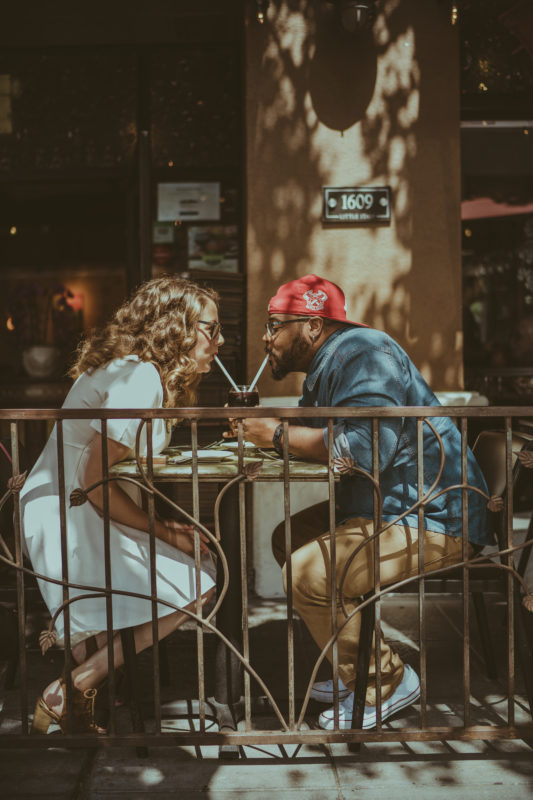 Couple sharing a moment together at an outdoor café